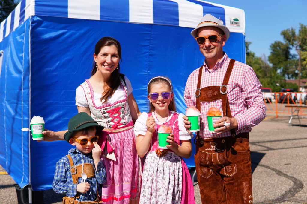 Family enjoys shaved ice at Oktoberfest