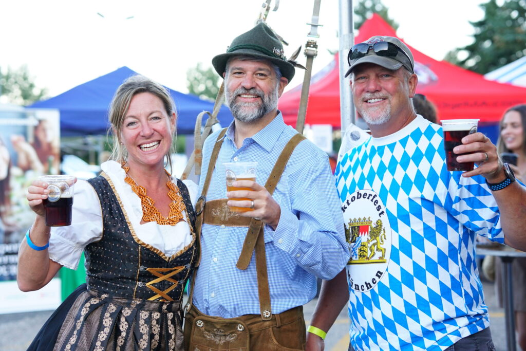 Guests raise a toast at Denver Kickers Oktoberfest