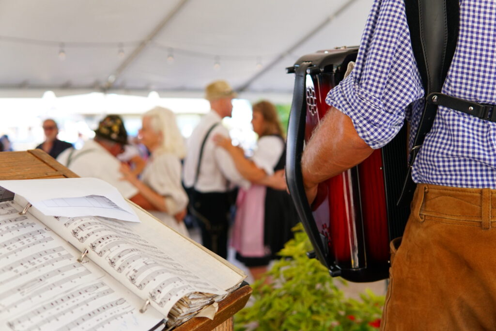 Accordion player performs authentic Bavarian folk songs