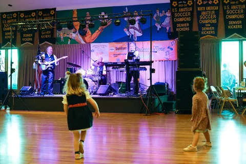 Young guests watching the live band