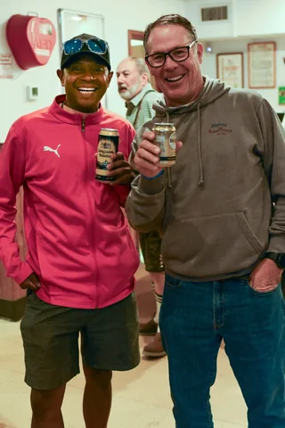 Two guests enjoying drinks together