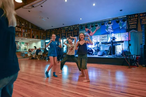 Guests joining the dancing near the stage