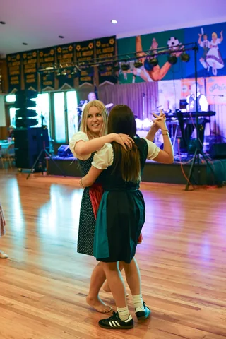 Two guests sharing a dance