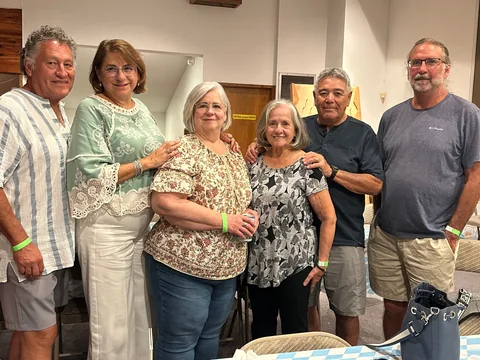 A group of guests together in the clubhouse