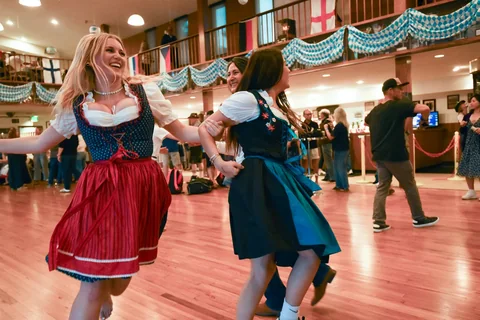 Friends smiling and dancing together