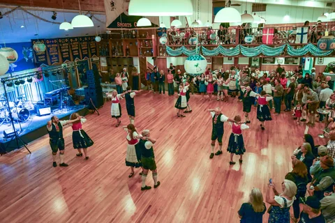 An overhead view of pairs performing on the dance floor