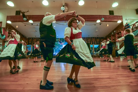 Partners turning together during a traditional dance
