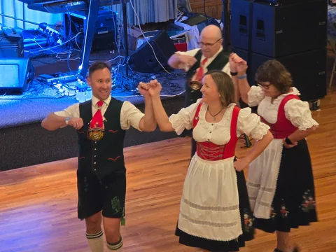 Schuhplattler dancers performing in traditional dress